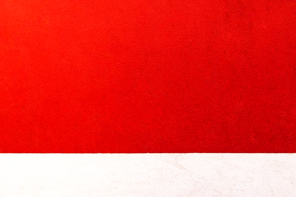 A red banner stacked on top of a white banner