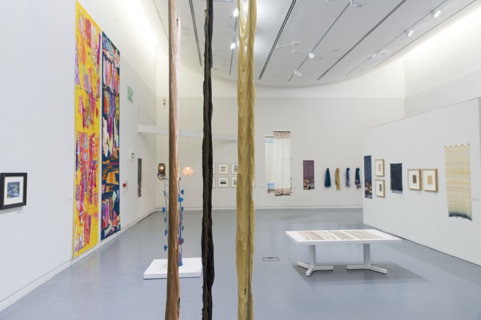 Gallery with various art work on walls
